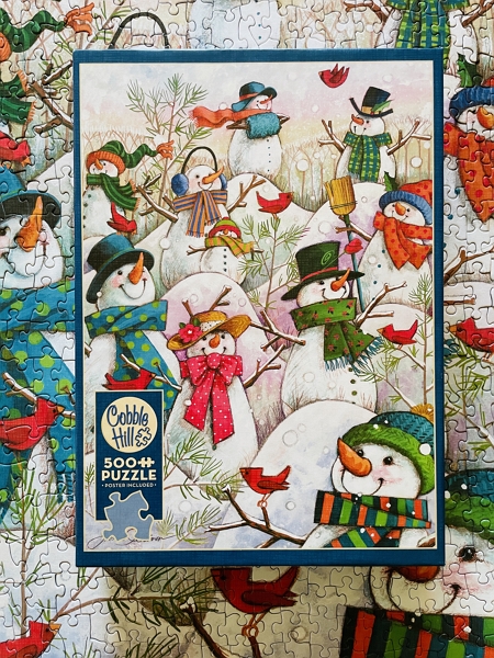 Hill of a lot of snowmen puzzle with box