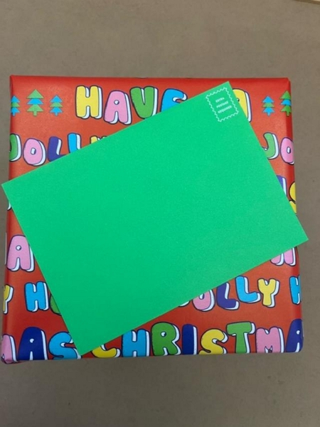 wrapped gift with puzzle card