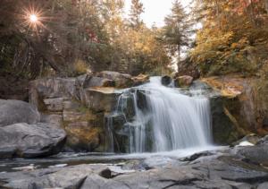 In The Village of St. Simon Waterfall Jigsaw Puzzle By Pierre Belvedere